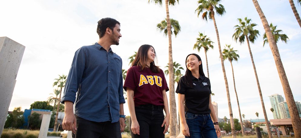 Three students walking around ASU's campu