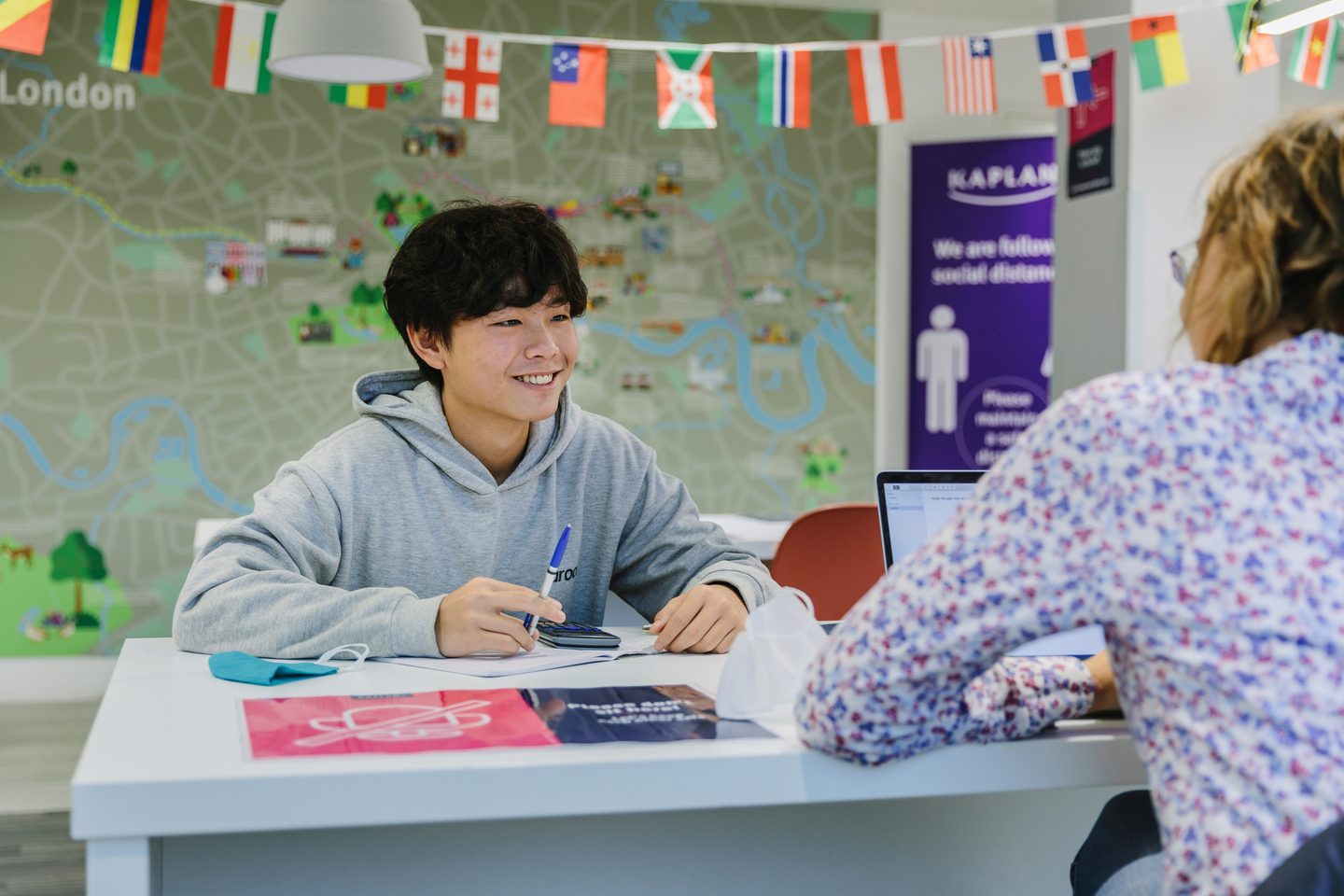 Student with a smiling face at the student services