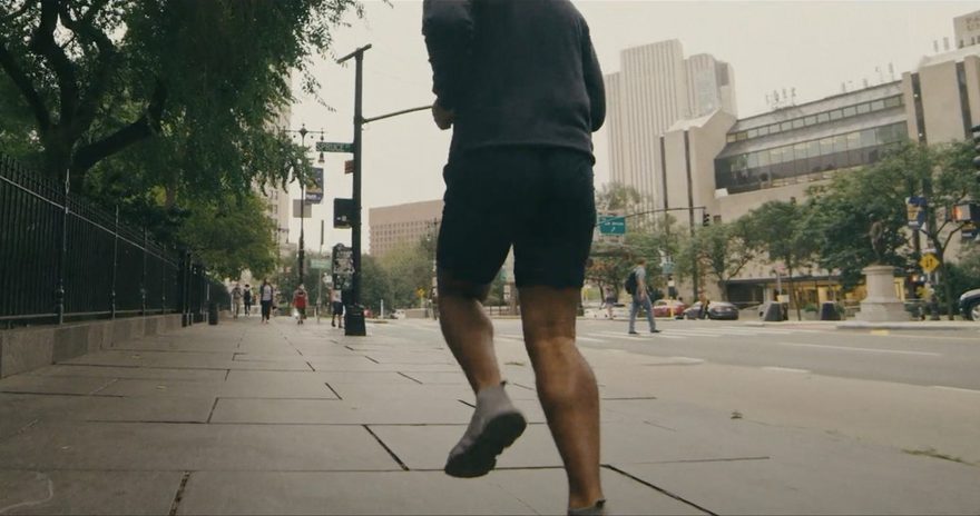 person jogging across the street