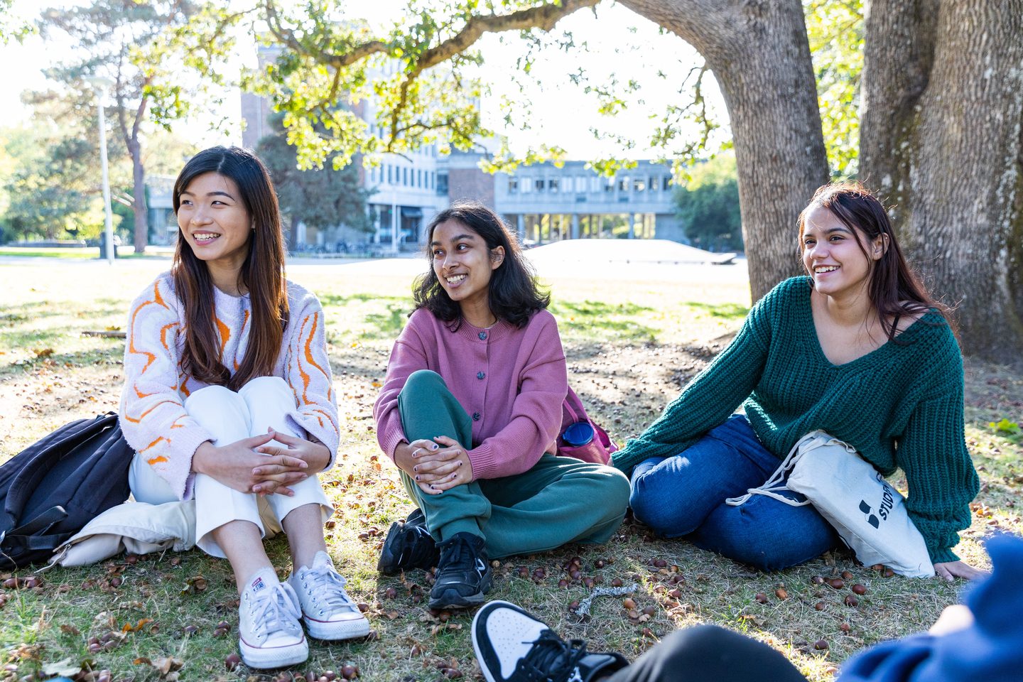 UVic students sitting on the grass