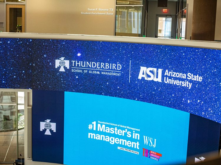 Thunderbird School of Global Management logo on screen at Downtown Phoenix campus building