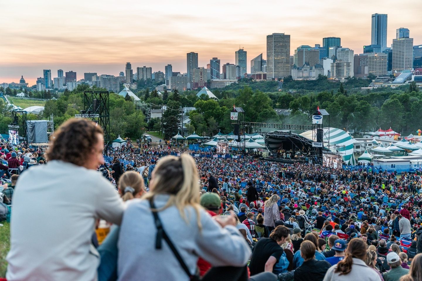 People at the Edmonton folk music festival enjoying a band live performance